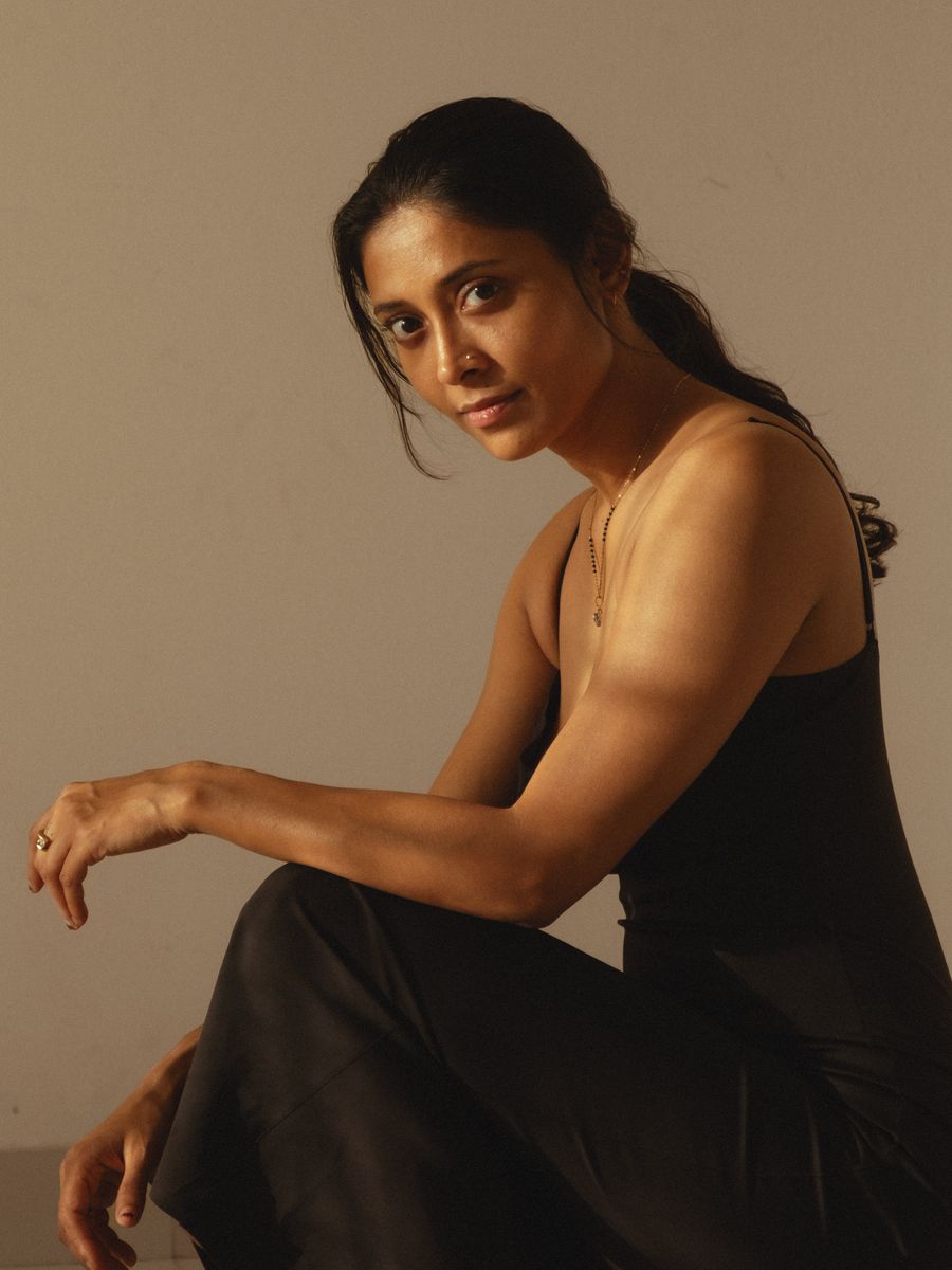 Shambhavi, seated, in warm light