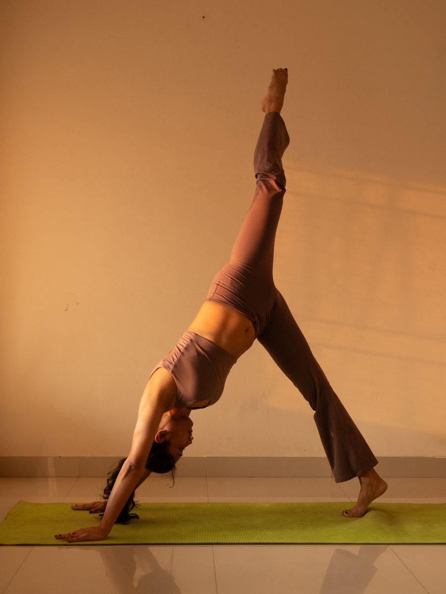 A one-legged downward dog, long and open